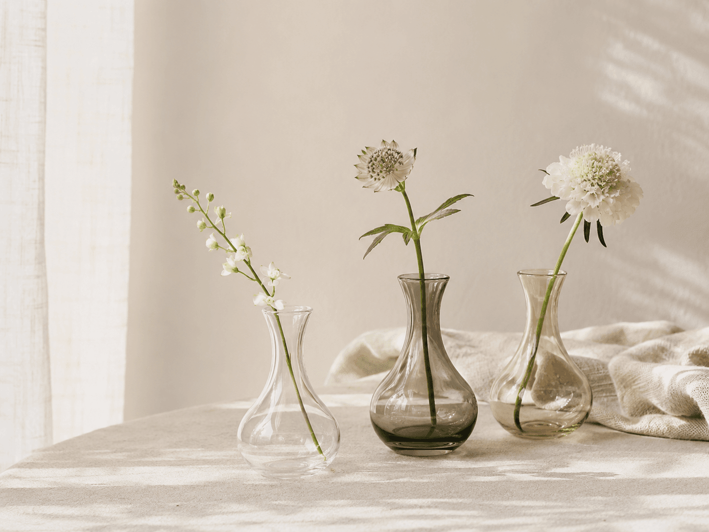 Vases & Florals — Bud vases and statement vessels for single stems to full bouquets.